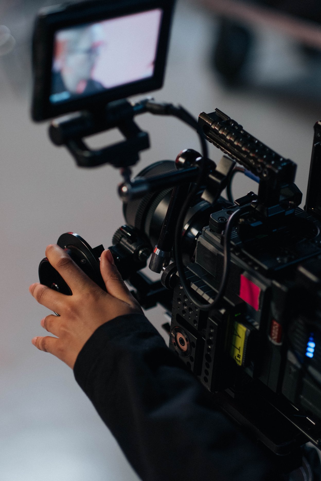 Person Holding Black Video Camera